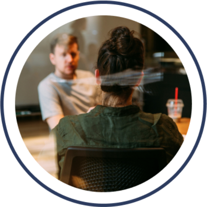 Sea-Watch.org logo featuring binoculars in front of a lifebuoy above stylized ocean waves.