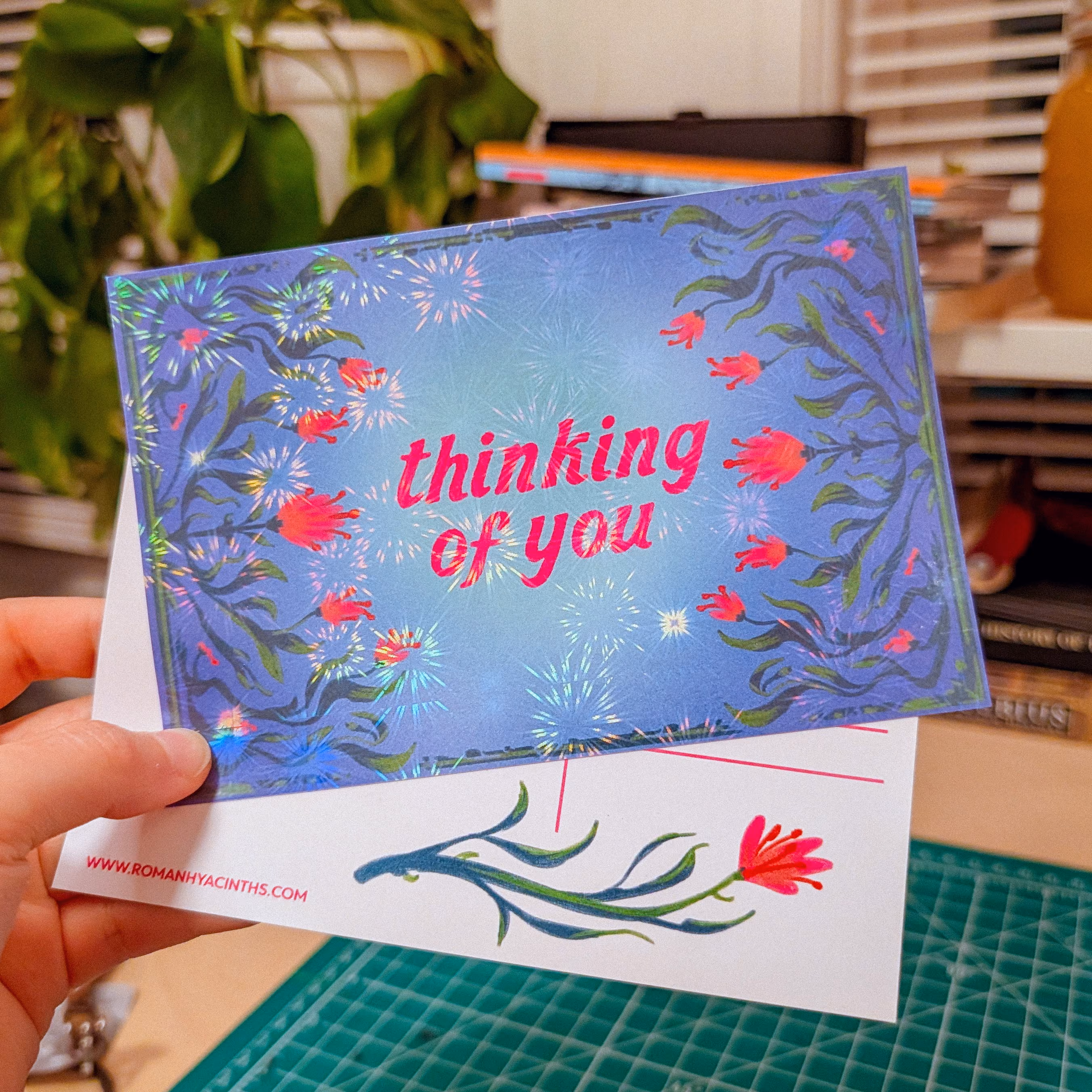 A "Thinking of You" floral postcard
