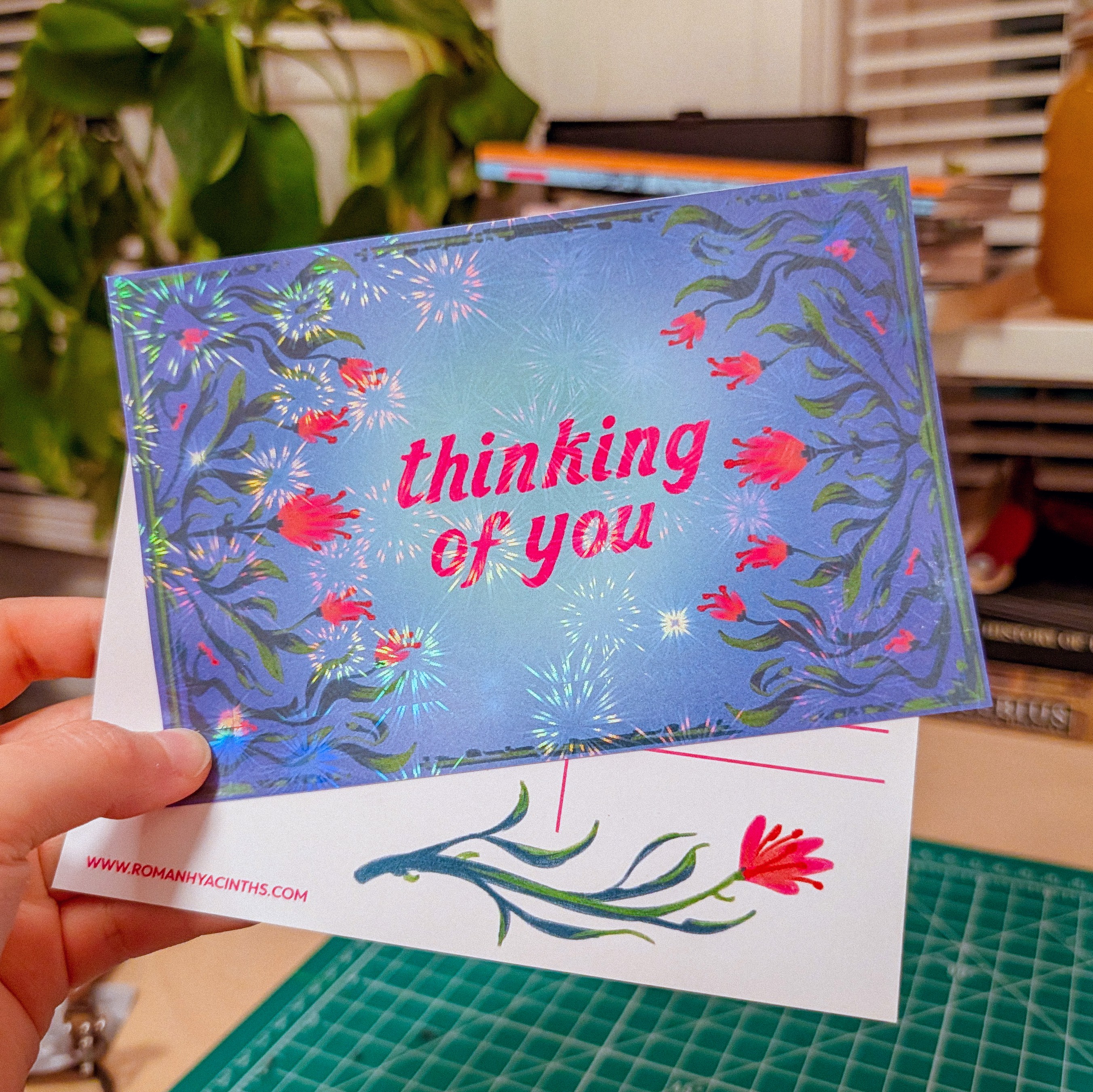 A "Thinking of You" floral postcard