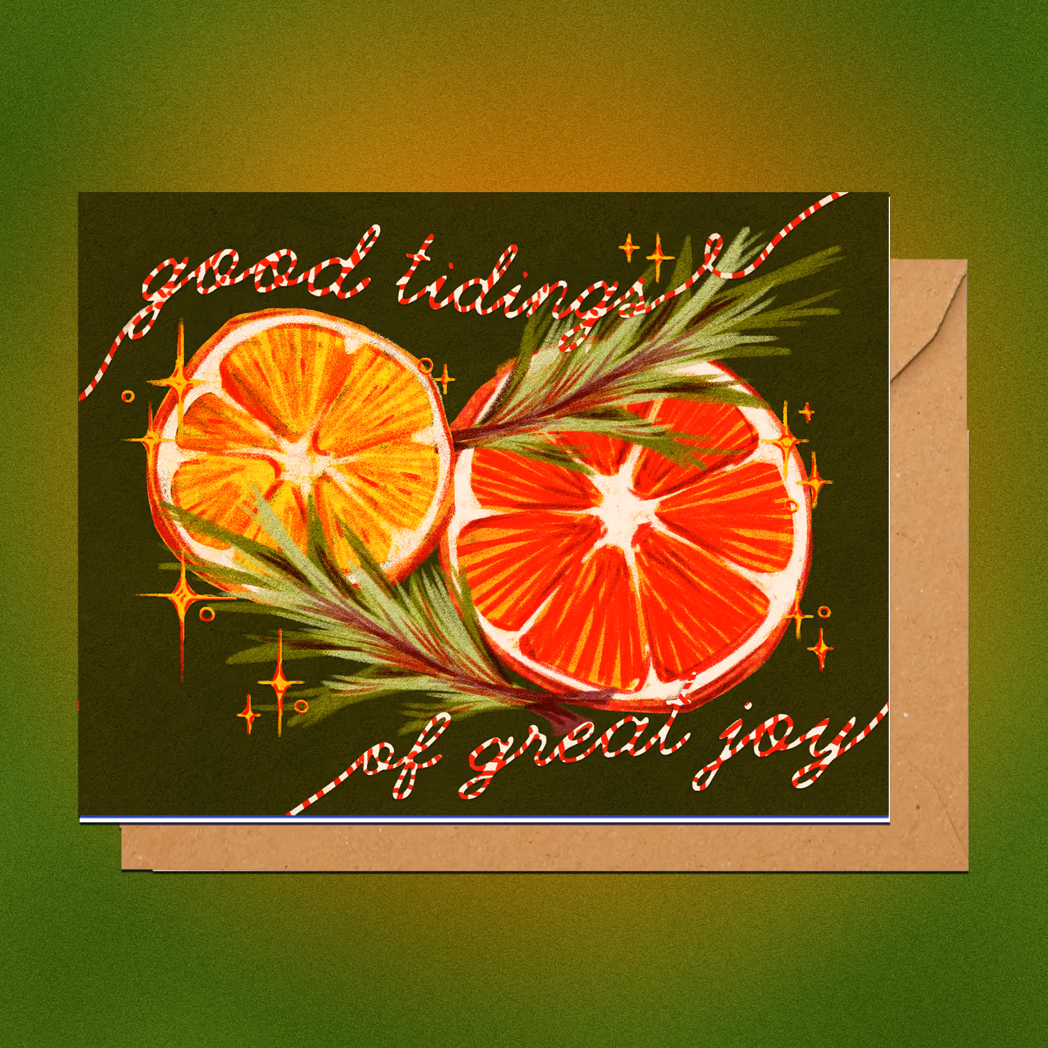 A Christmas card featuring dried oranges and the phrase "good tidings of great joy"
