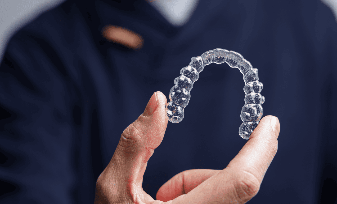Close-up of a clear aligner for straightening teeth discreetly at the best Invisalign dentist in Santa Clara