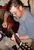 A man playing an acoustic guitar