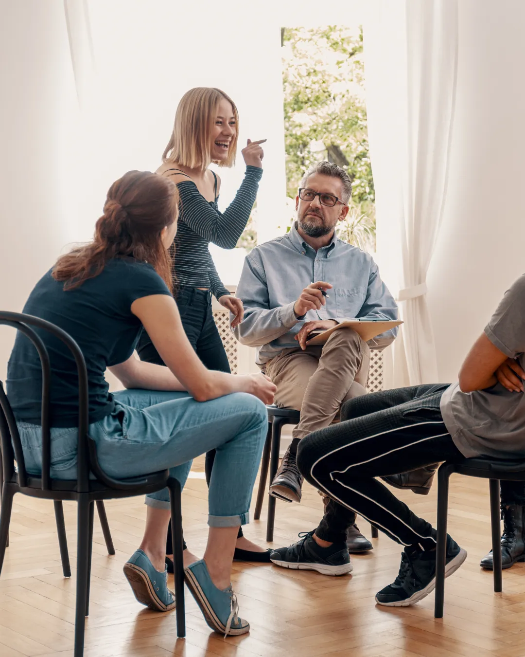 Group therapy session at an alcohol and drug rehab center in Newtown, PA.