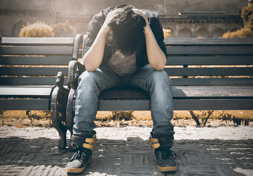 Woman struggling with substance misuse seeking addiction treatment in Pennsylvania