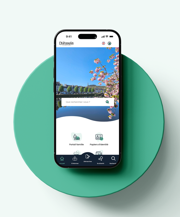 Affichage en gros plan de l'application mobile de Châteaulin, ouverte sur une interface claire et intuitive avec fond fleuri et accès rapide aux démarches.
