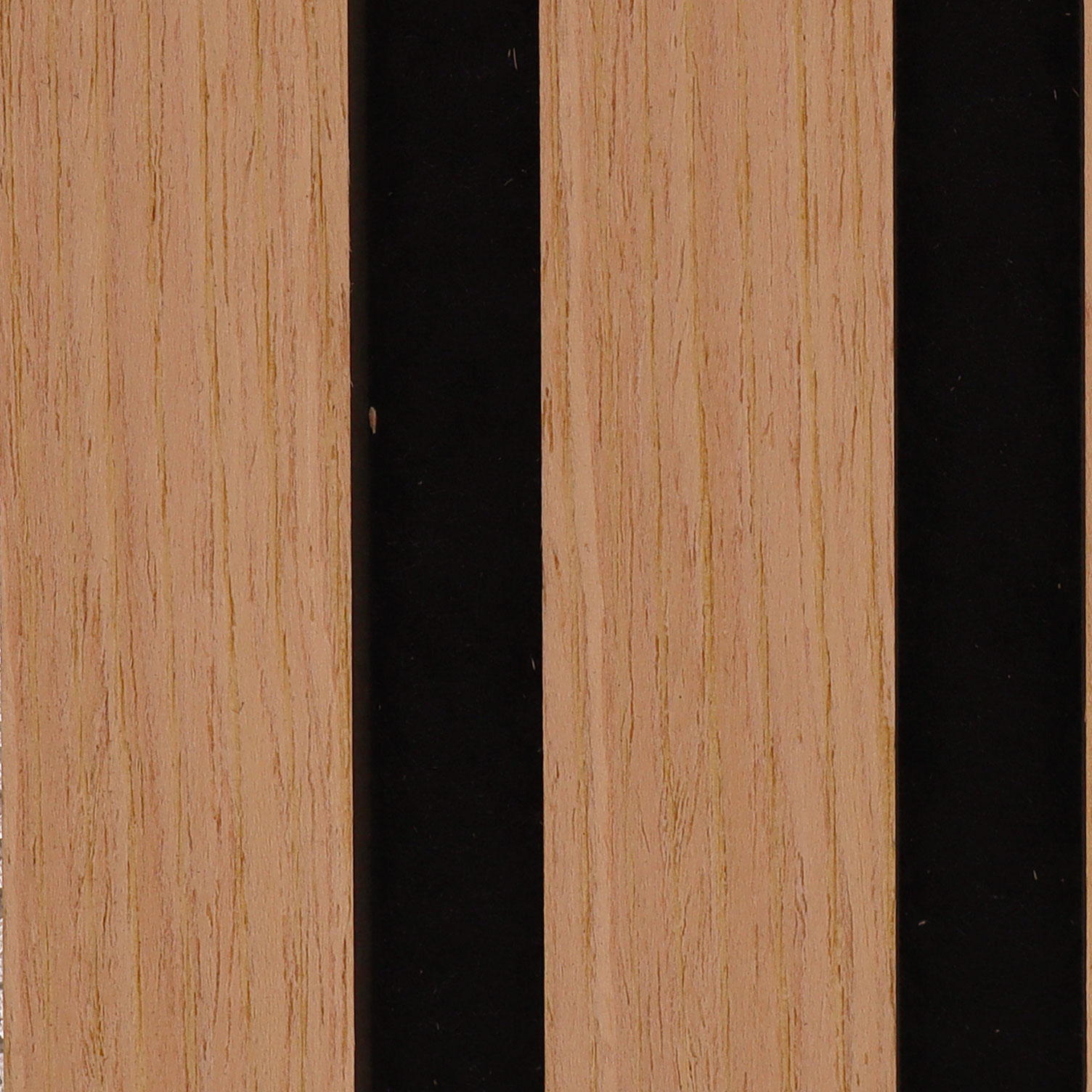Close-up of light wood planks separated by narrow black gaps arranged vertically.
