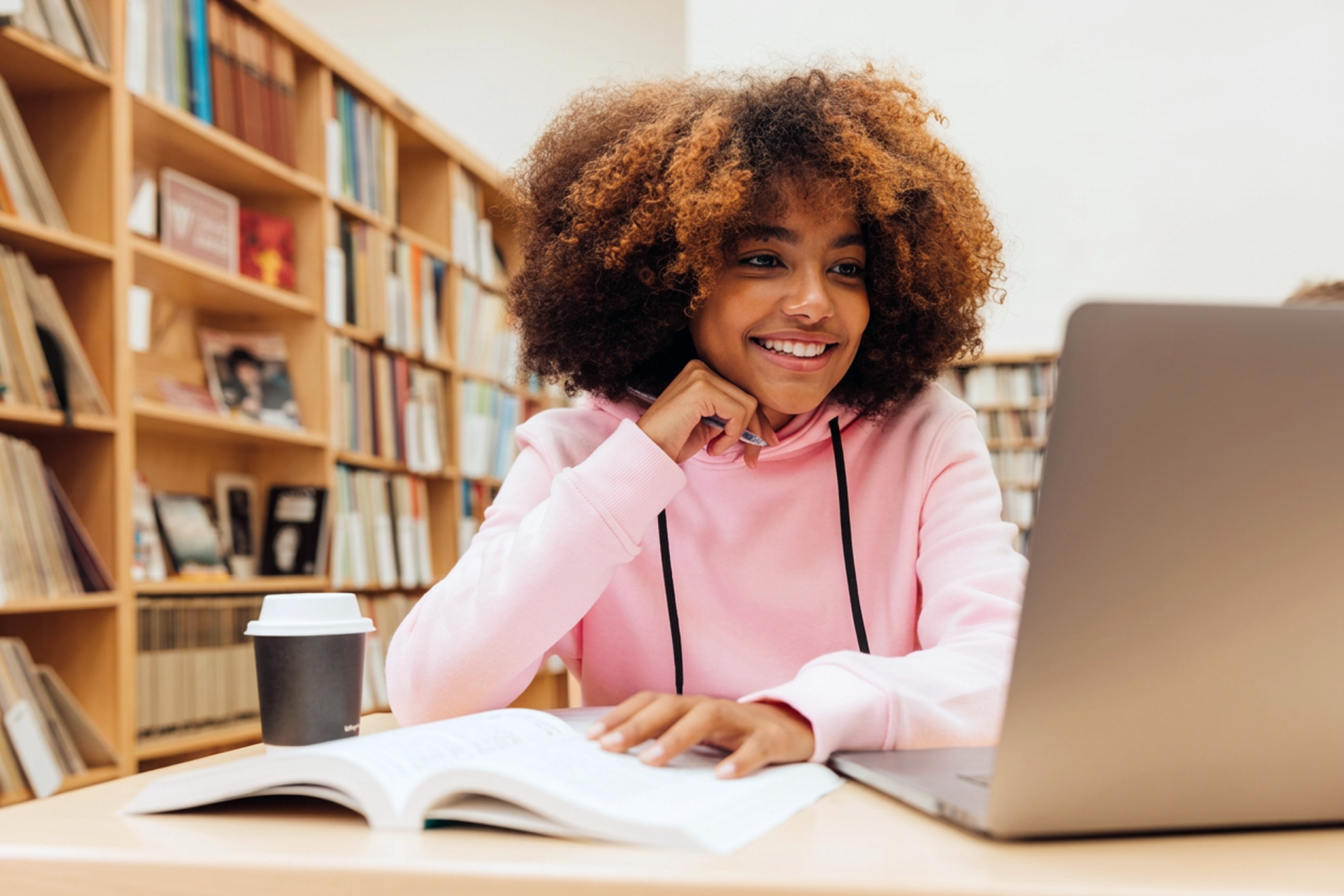 University students working collaboratively in a university library.