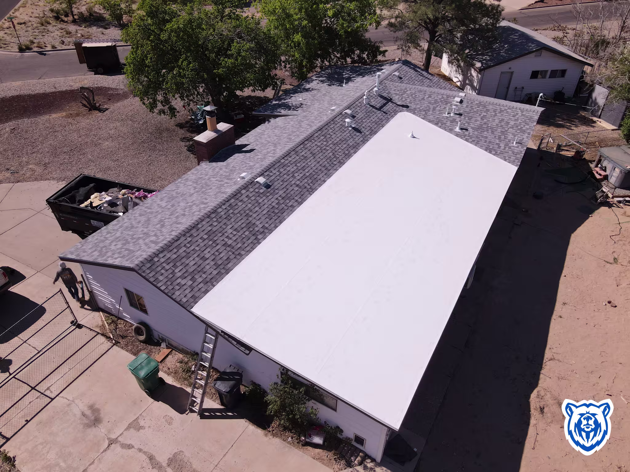 Mixed roof replacement with shingles and TPO in Rio Rancho NM