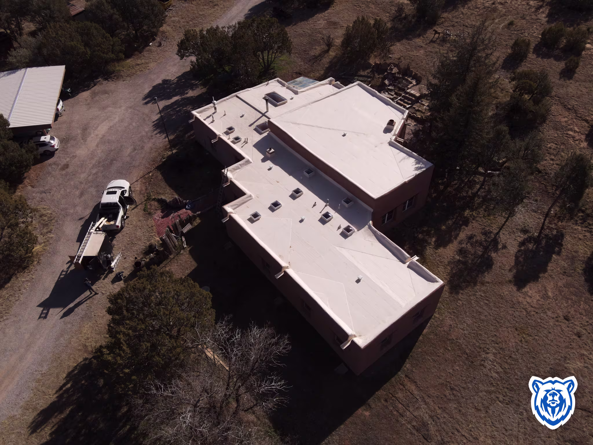 Flat roof replacement to Tan TPO in Sandia Park, NM