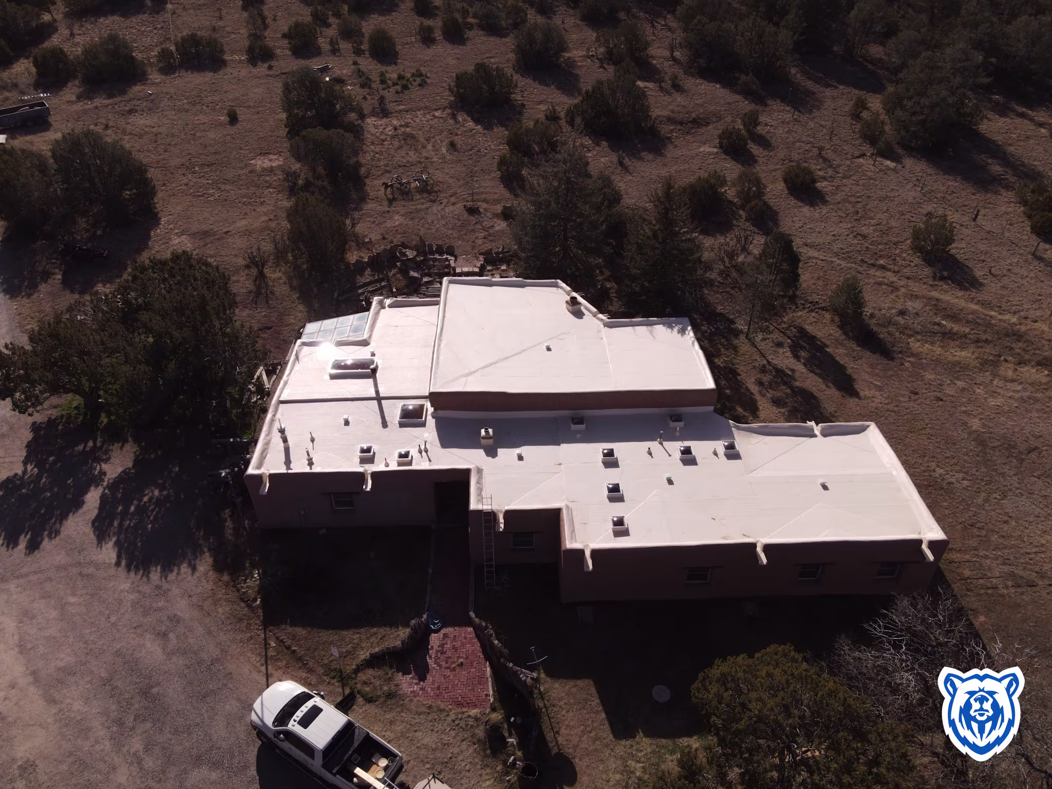 Flat roof replacement to Tan TPO in Sandia Park, NM