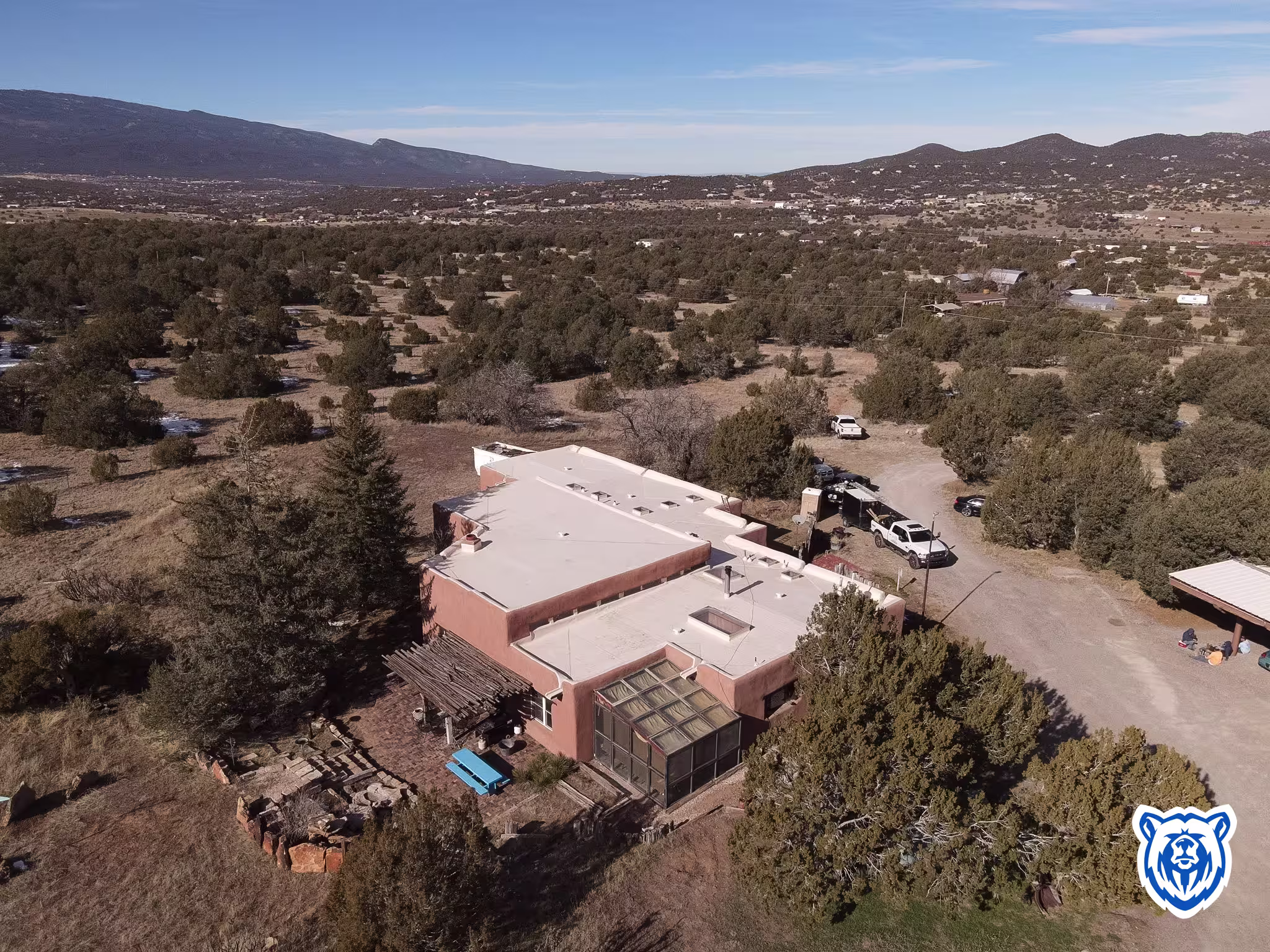 Flat roof replacement to Tan TPO in Sandia Park, NM