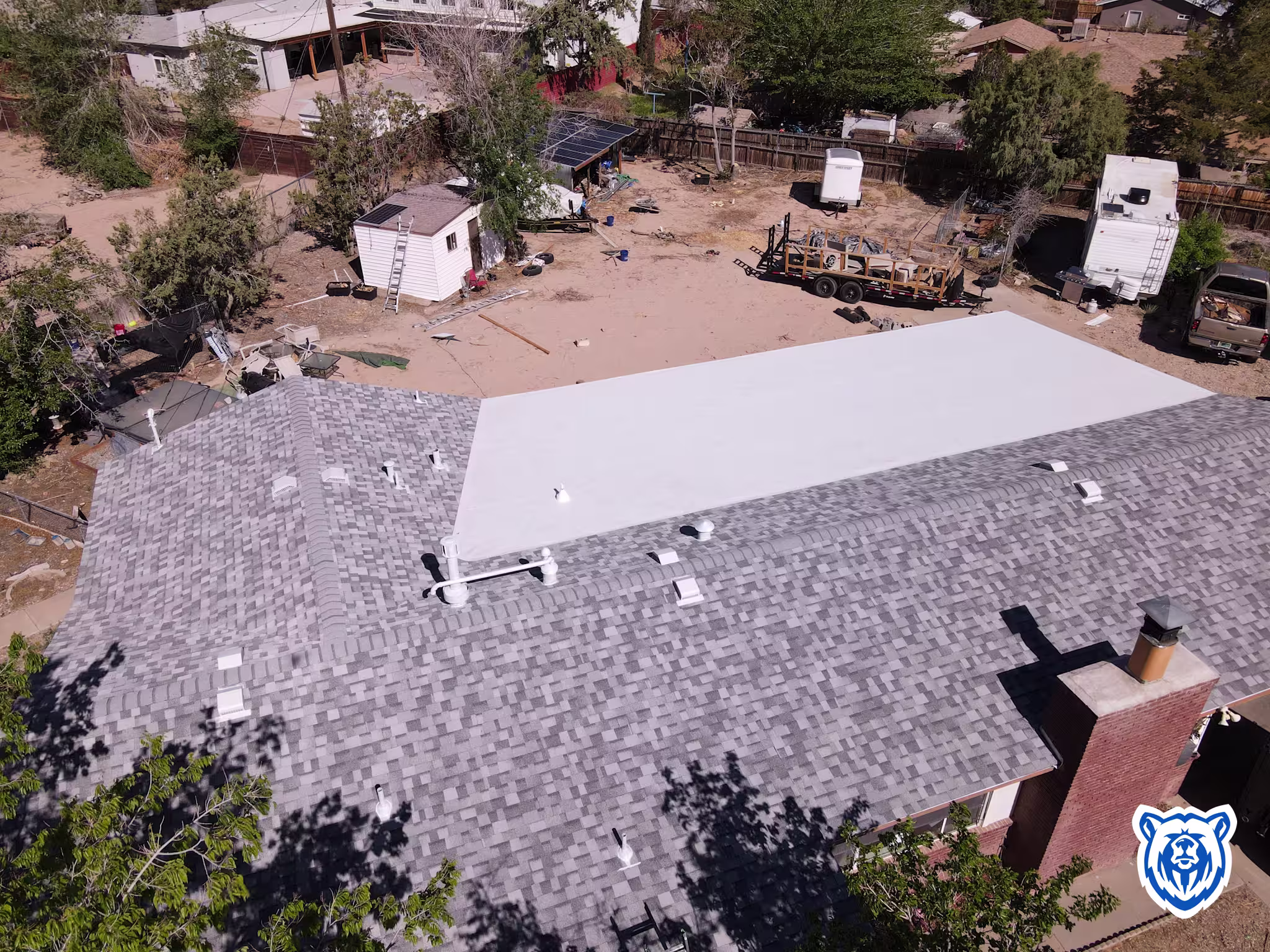 Mixed roof replacement with shingles and TPO in Rio Rancho NM