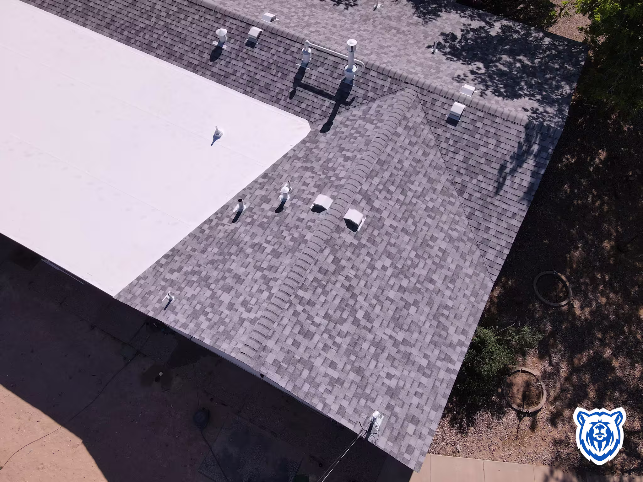 Mixed roof replacement with shingles and TPO in Rio Rancho NM
