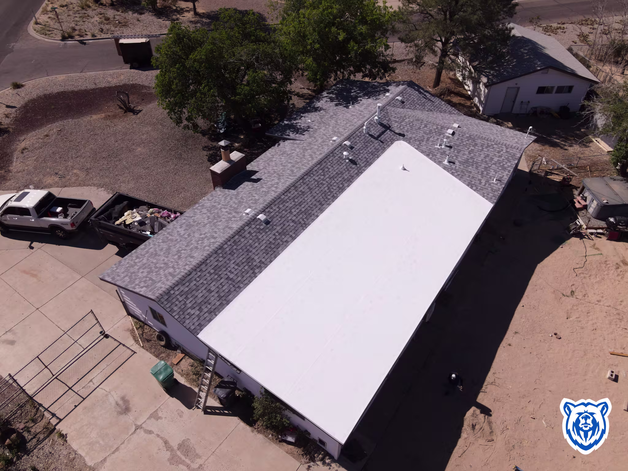 Mixed roof replacement with shingles and TPO in Rio Rancho NM