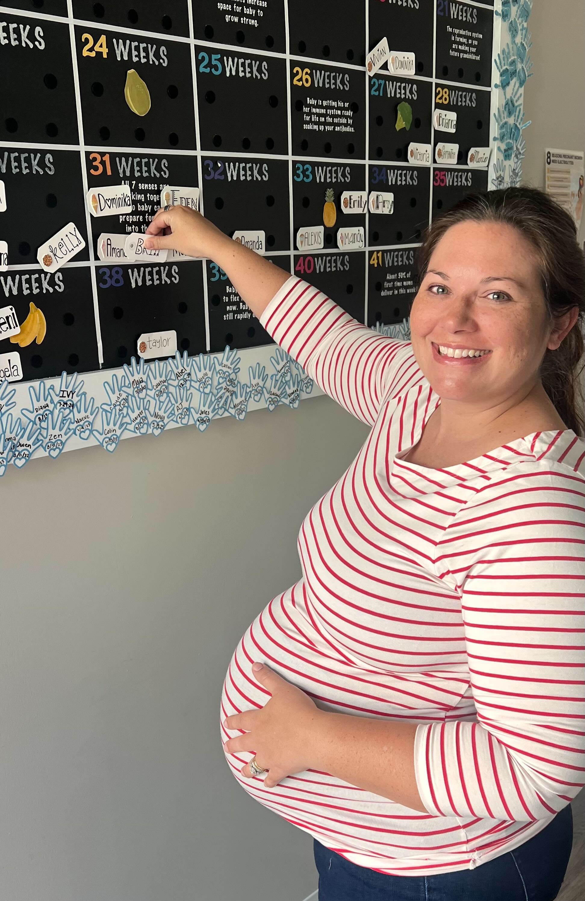 Matt Morris providing postpartum recovery support to a Parrish mom with personalized care at Pinnacle clinic.