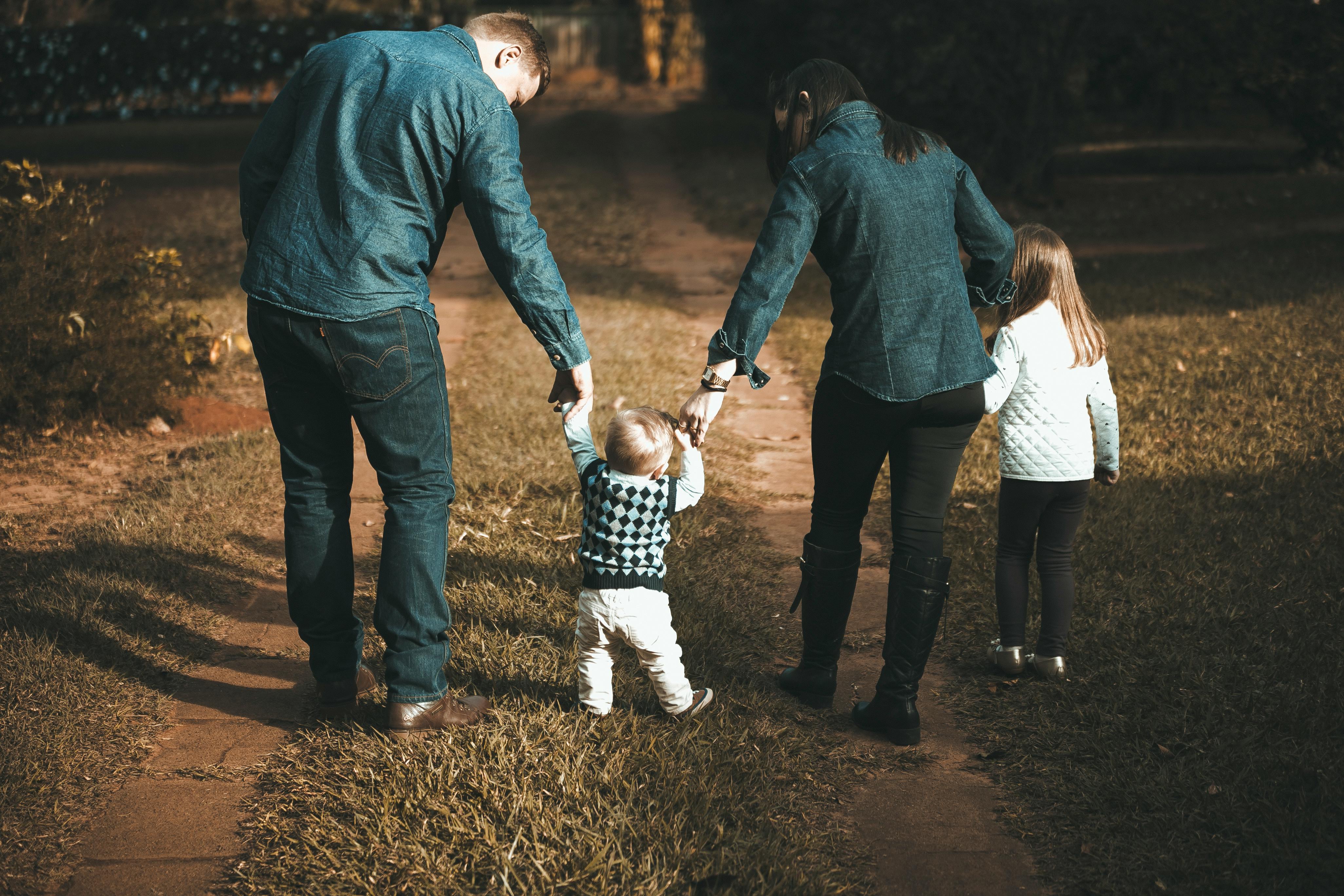 Florida parents walking with children, symbolizing freedom of choice in healthcare decisions.