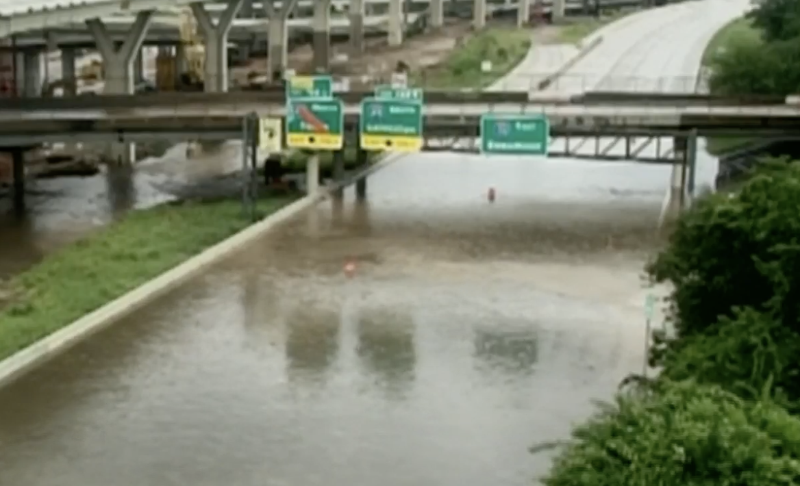Tropical disturbance brings heavy rain, flood warnings