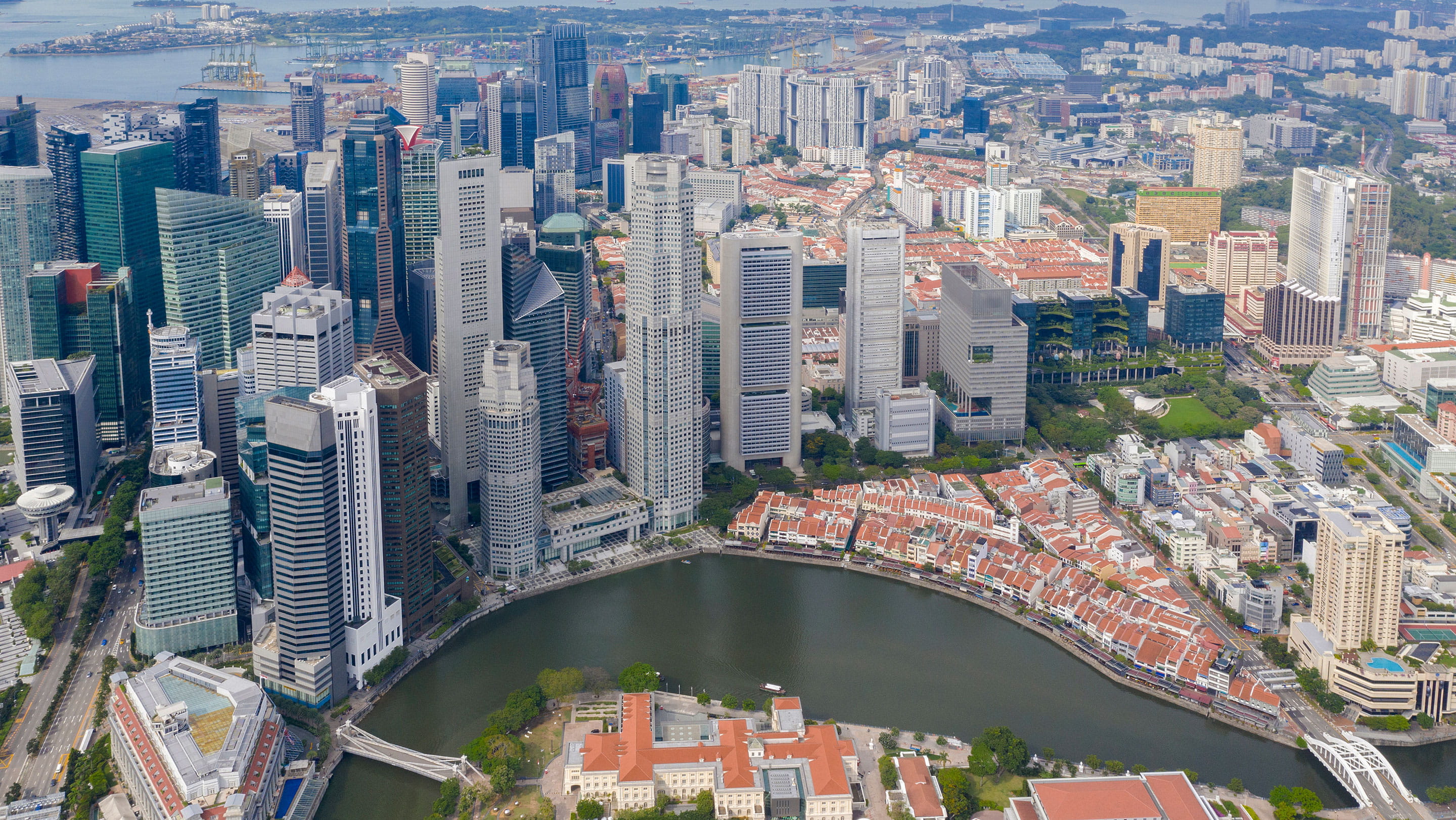 Aerial view of Singapore’s central business district with modern office towers, financial institutions and Marina Bay, illustrating Singapore’s fund management and financial services sector.