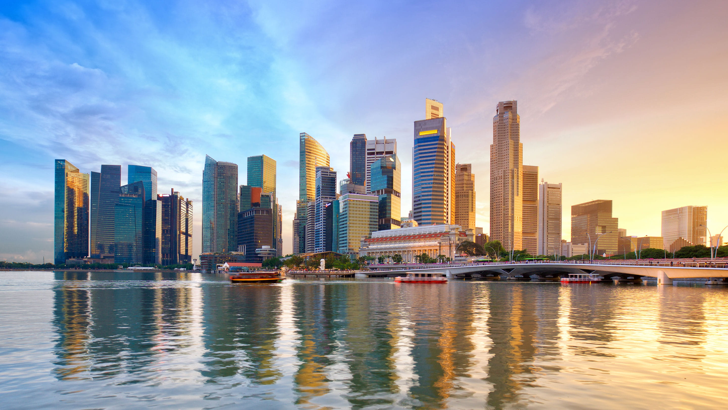 Singapore financial district skyline at sunset, representing Singapore's National Anti-Money Laundering Strategy and its impact on corporate service providers and financial institutions.