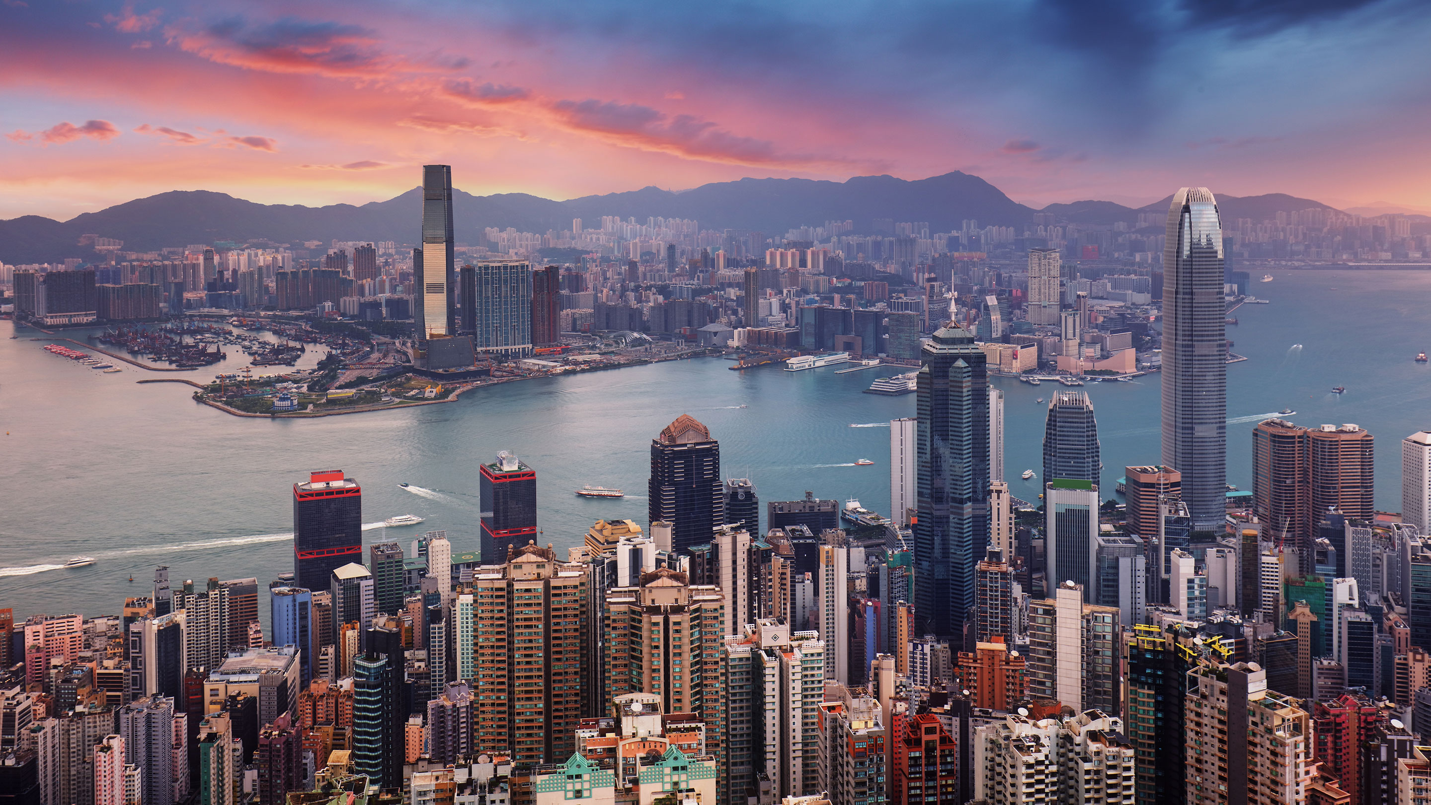 Panoramic view of Hong Kong’s skyline and Victoria Harbour, illustrating the city’s 2026–2030 five-year plan for businesses and family offices.