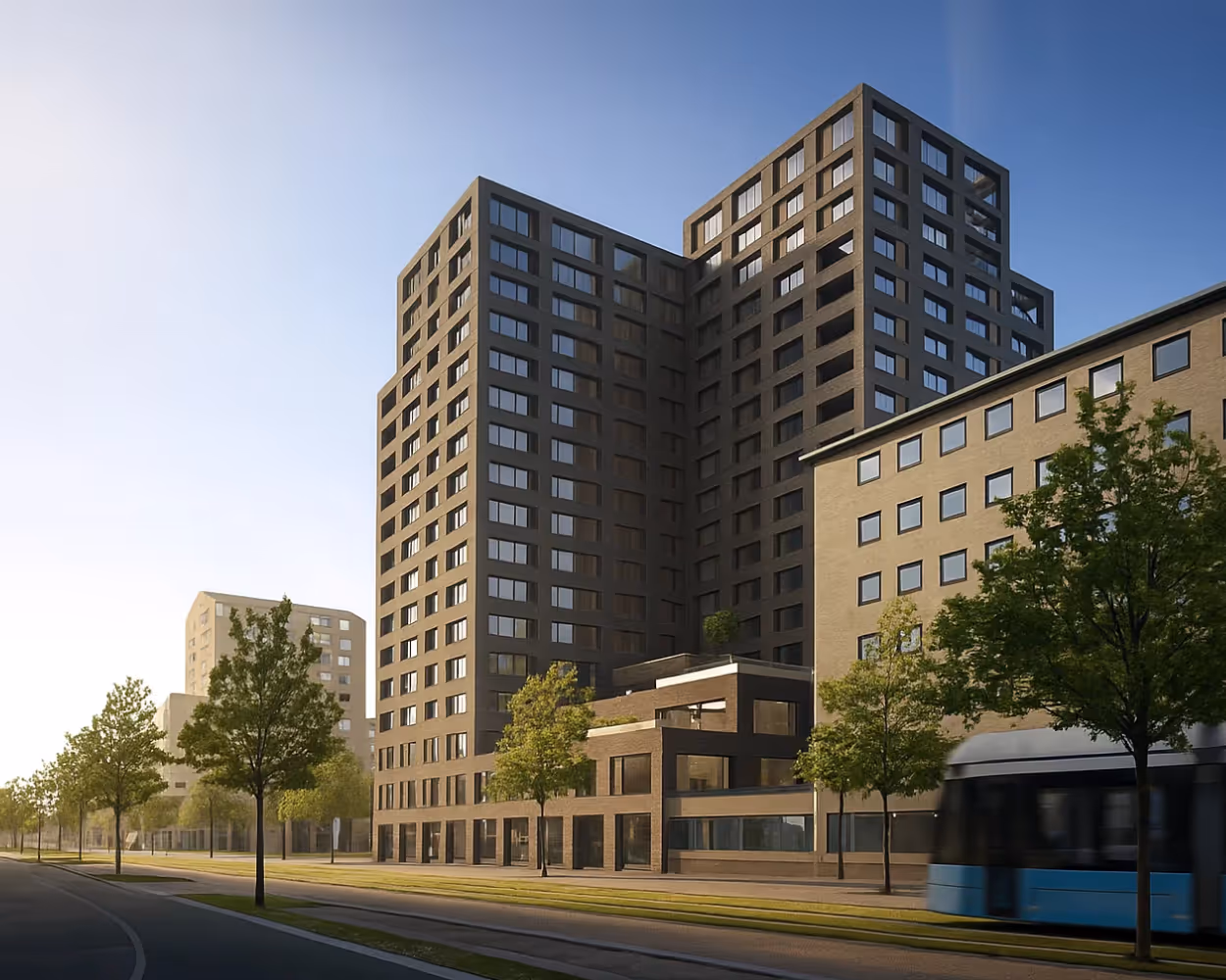 Bostadshus med blå himmel i bakgrunden