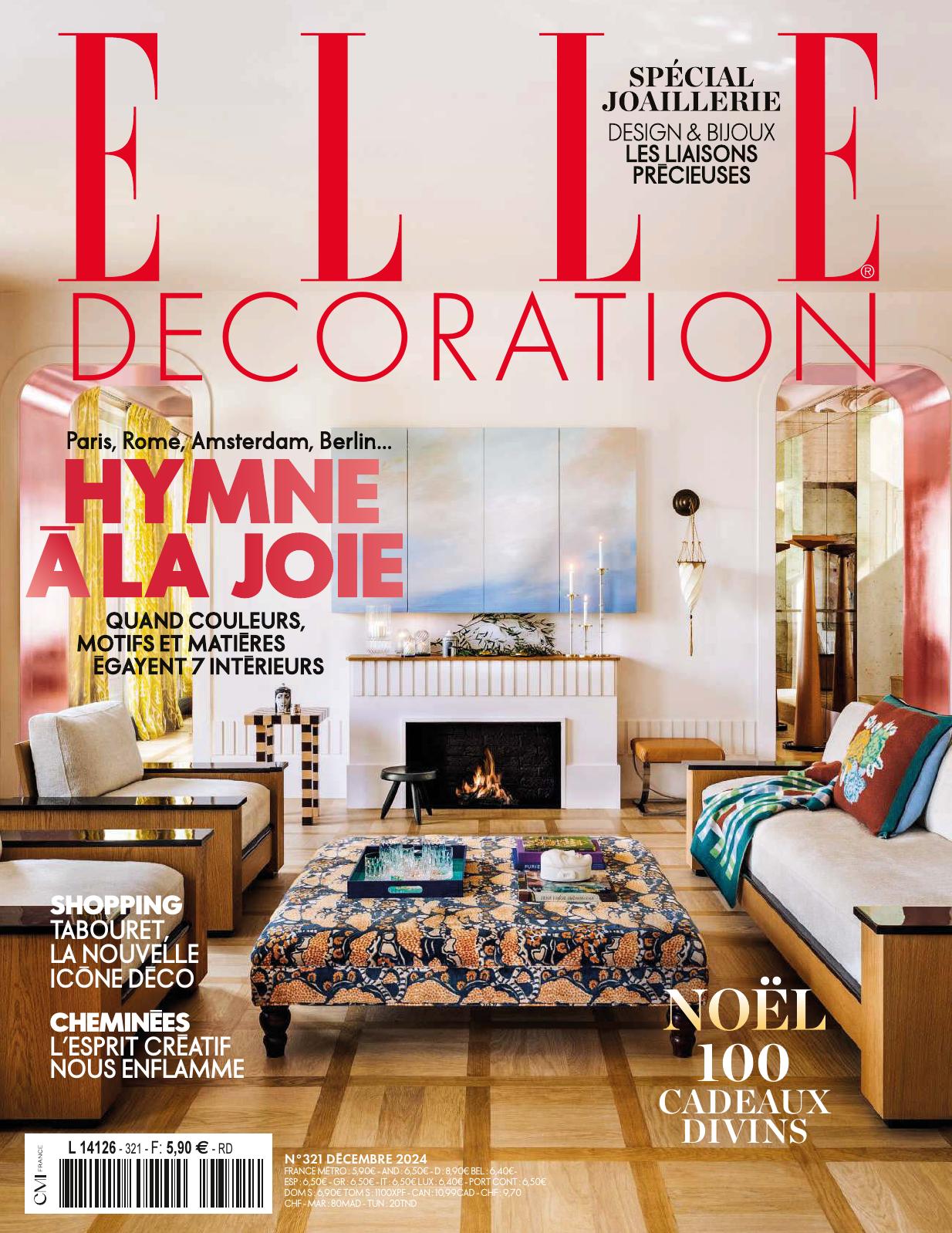 Couverture festive de Elle Décoration mettant en avant un intérieur éclectique et coloré, décoré pour Noël.