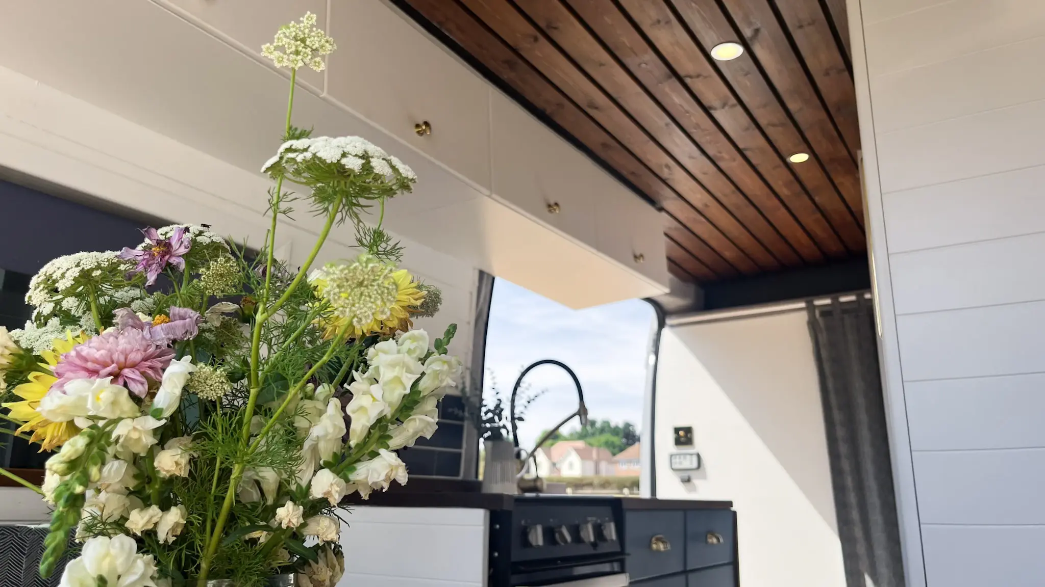 flowers on table in campervan
