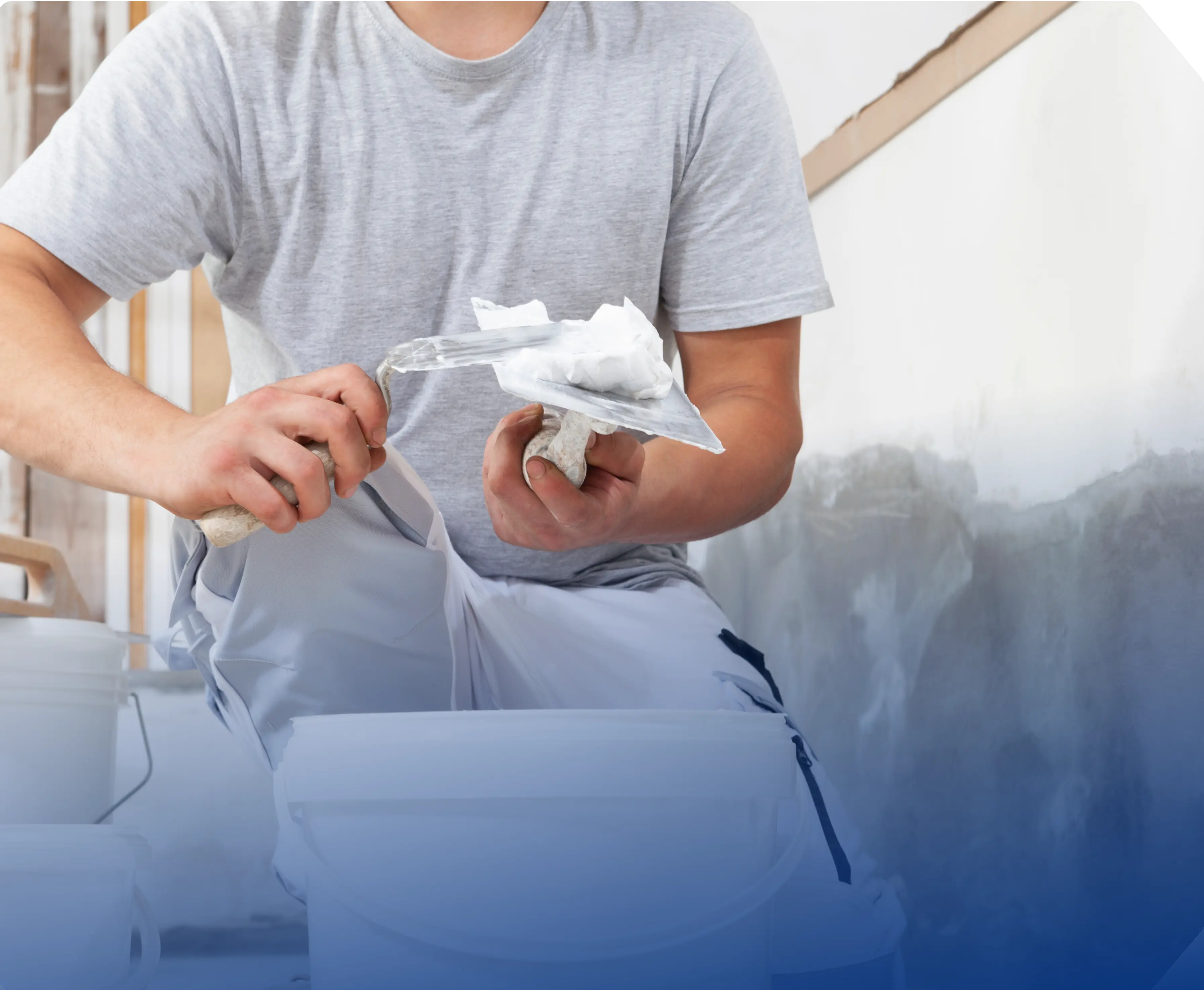 a man is working on a concrete slab