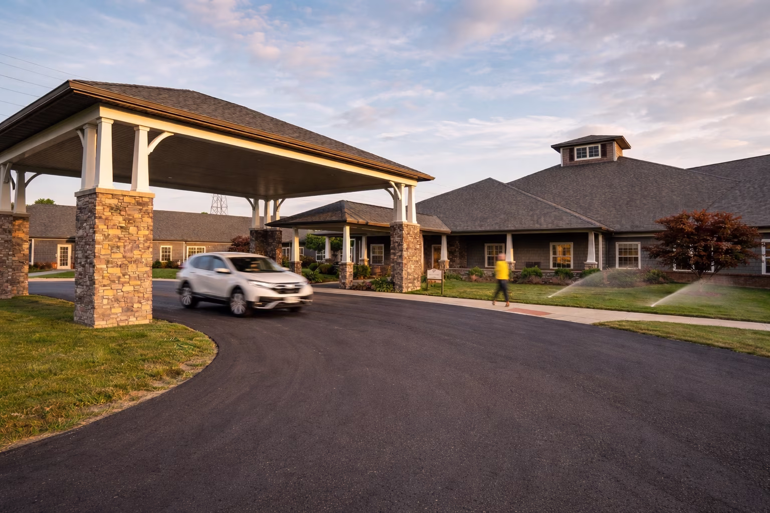 Exterior of GentleBrook Assisted Living South with covered entrance and easy drive-up access for senior care, visitors, and admissions.