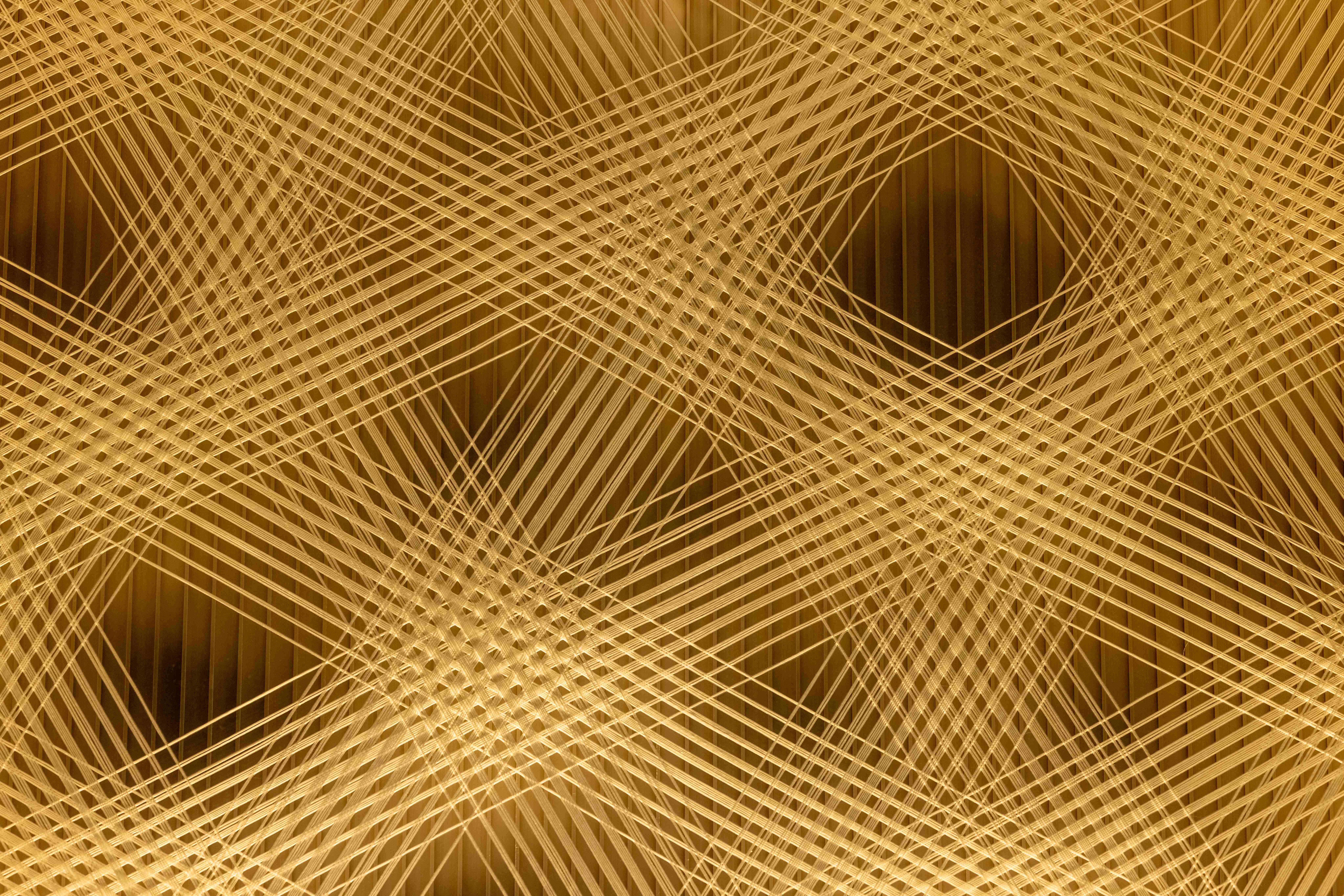 i-Mesh textile pattern showing light diffusion and dense layered mesh structure