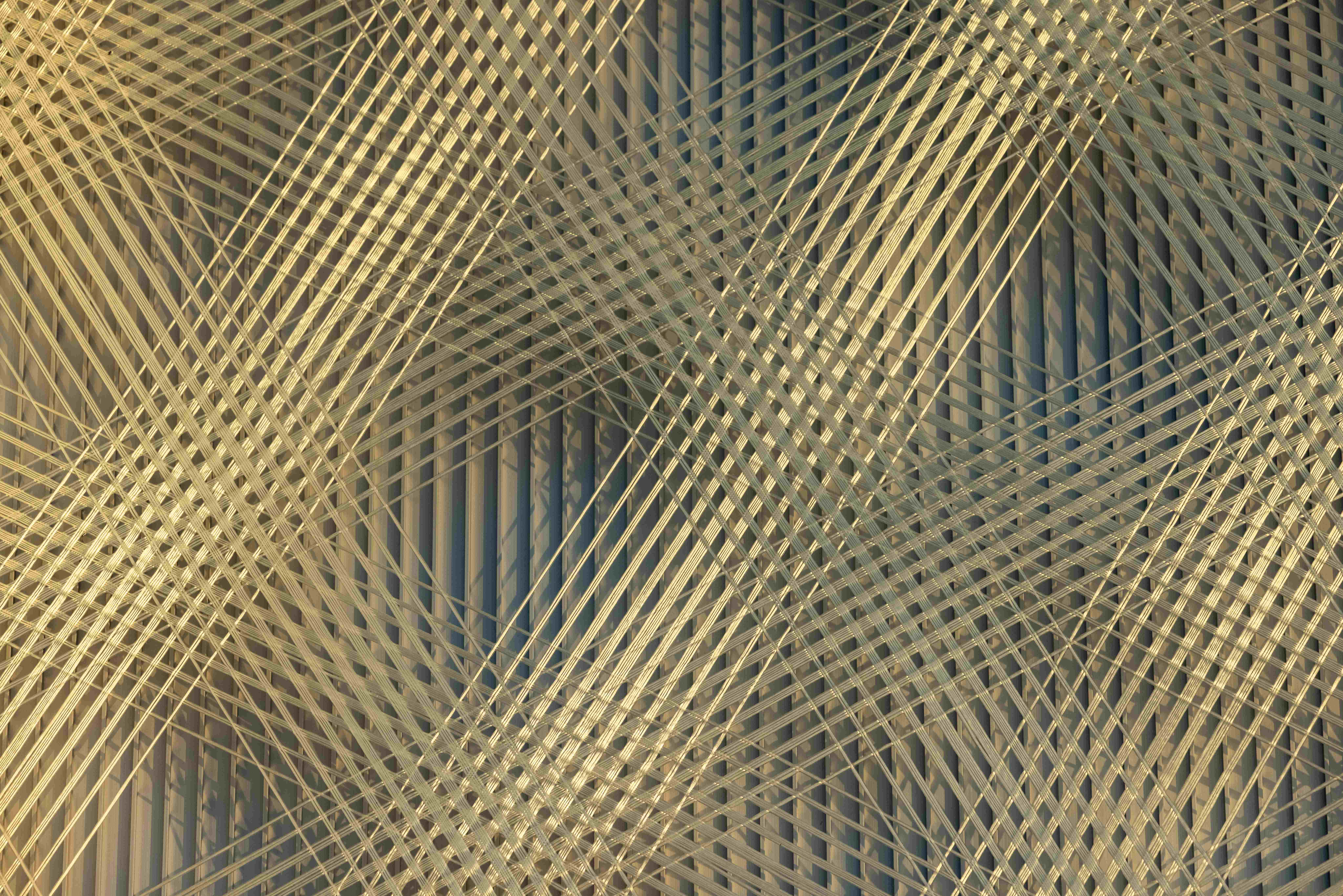 Detail of i-Mesh textile pattern showing layered mesh structure and light diffusion