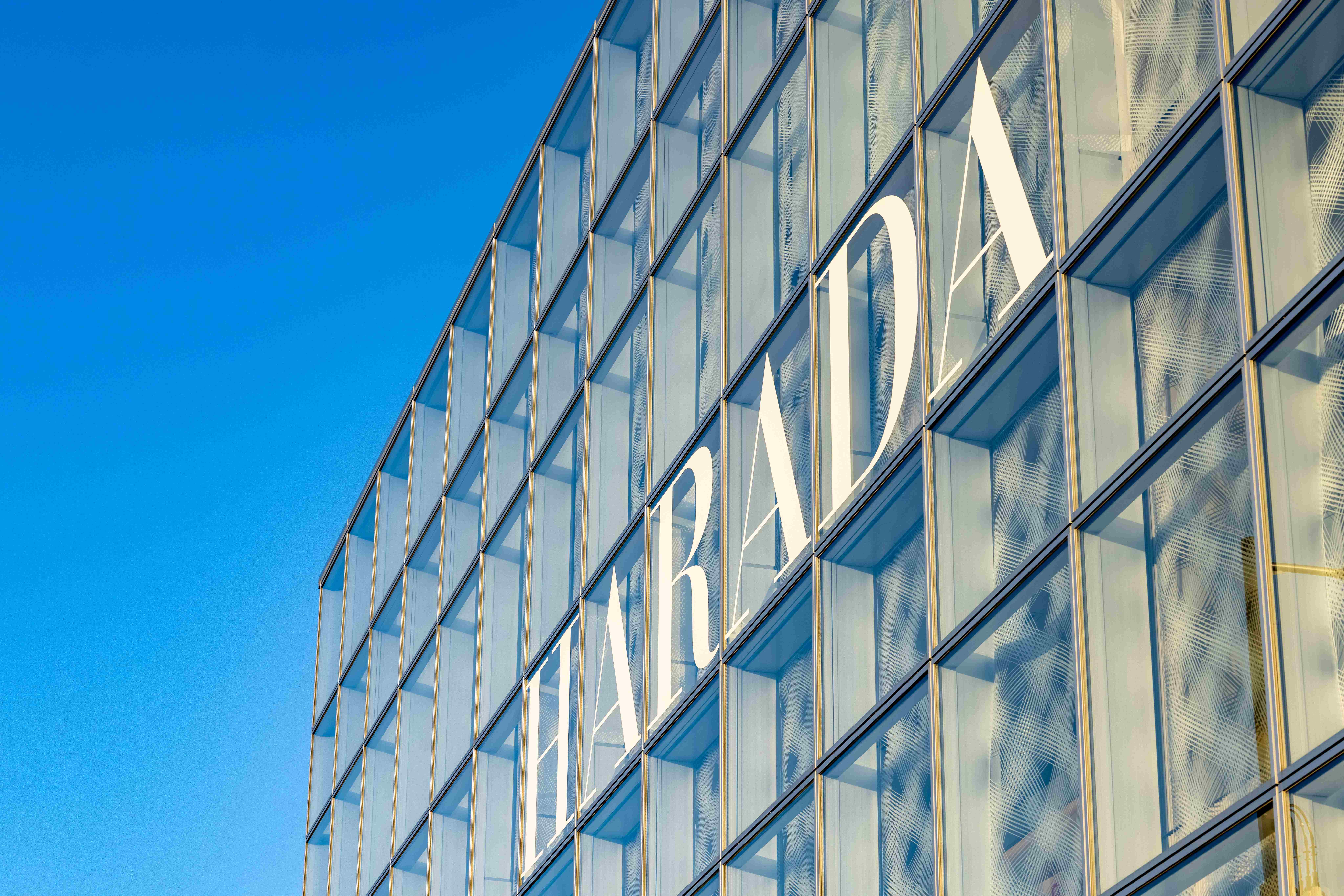 i-Mesh textile façade with patterned mesh on Harada building at Expo Osaka 2025