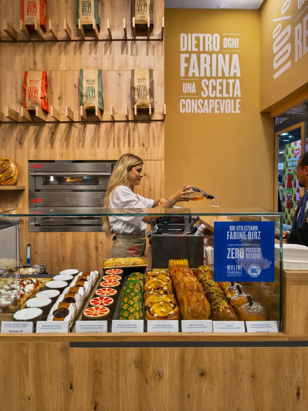 Pastry counter at the Molini Fagioli stand featuring baked goods made with OIRZ flour