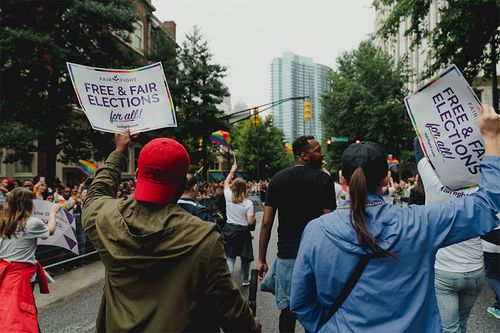 Image of people marching for voting rights
