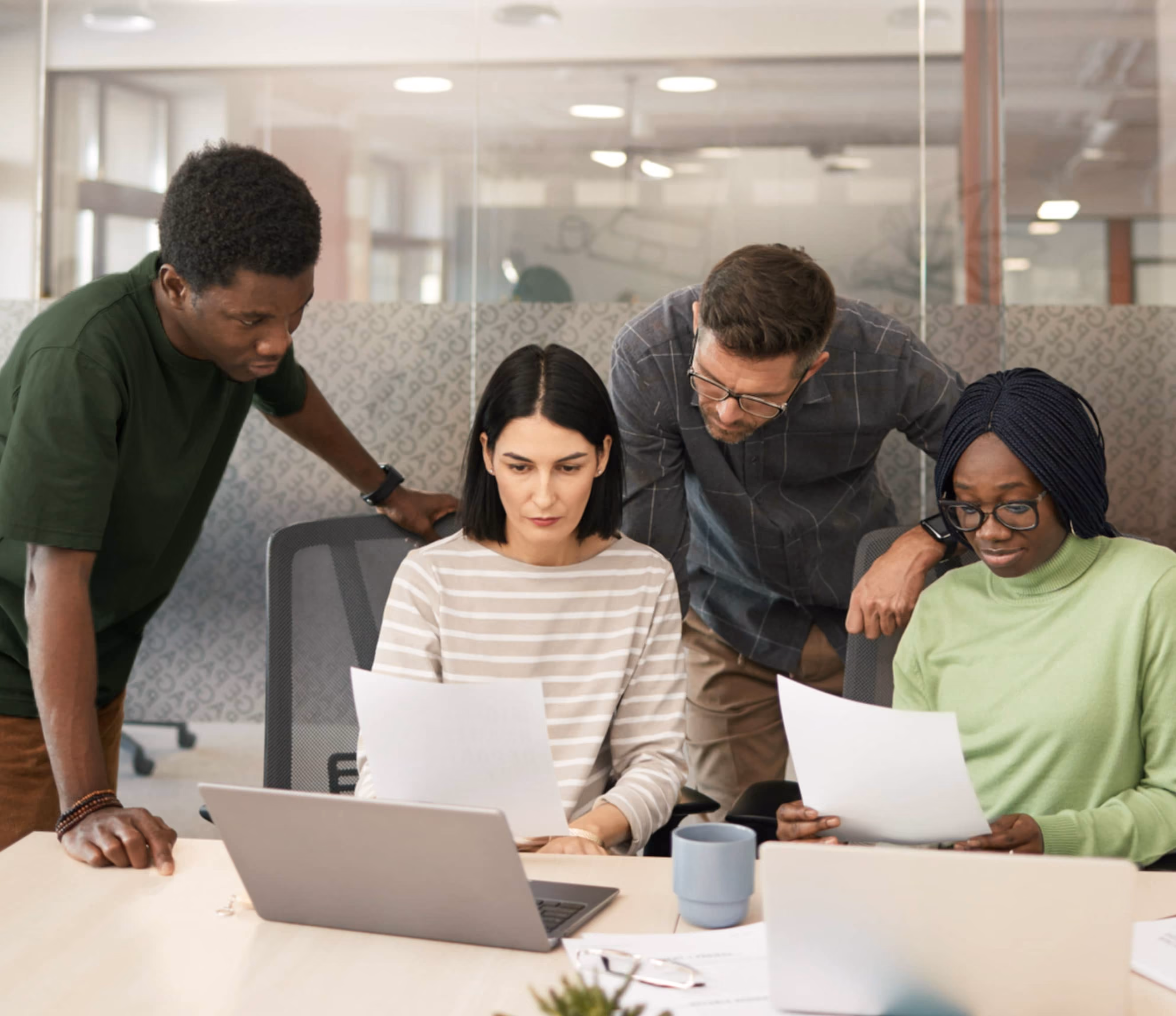 Financial professionals collaborating at a table