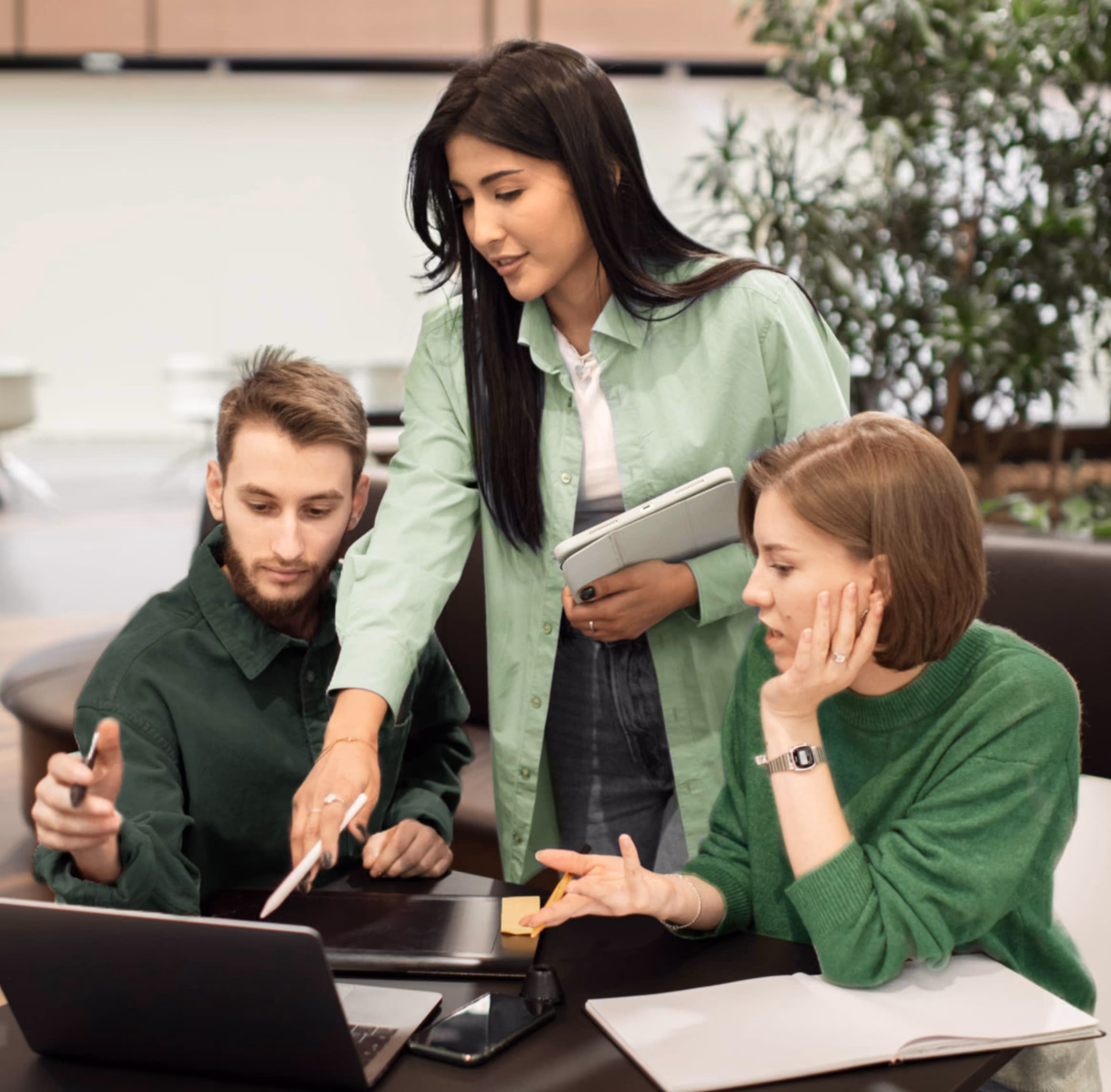 Financial professionals reviewing business information