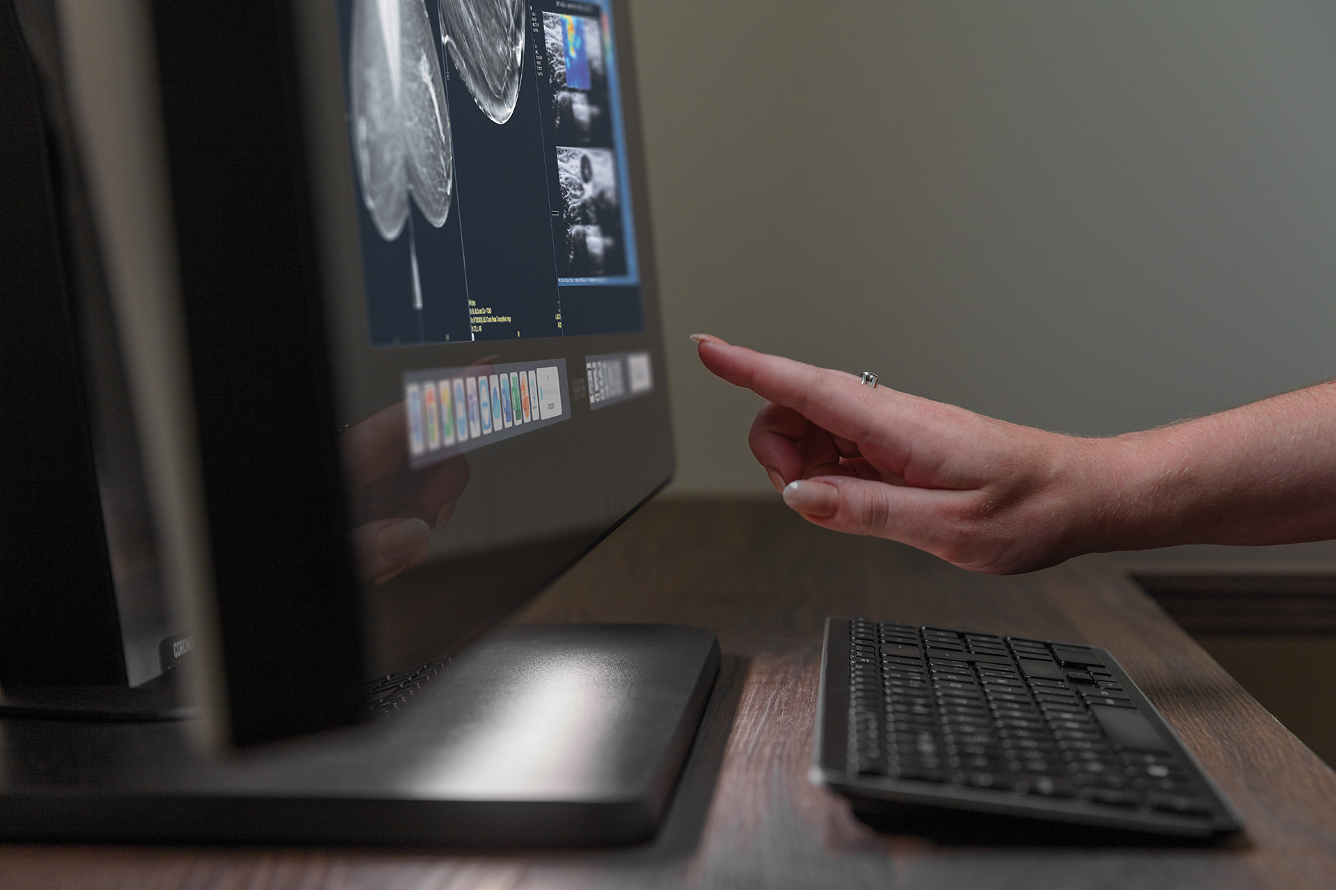 a finger going to touch the screen