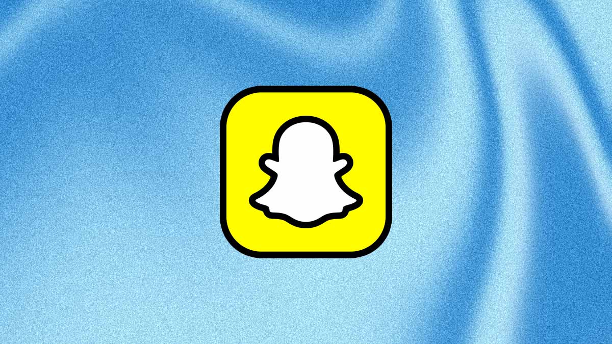 The Snapchat logo appears centered on a soft blue abstract background with subtle flowing shapes.