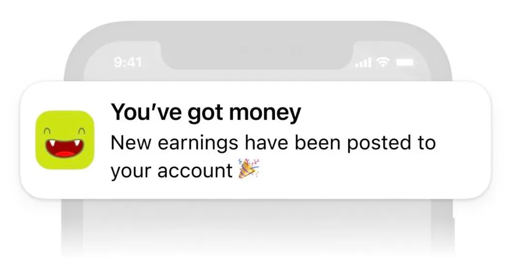 A "you've got money" push notification from the DistroKid app appears on top of a grayed out smartphone screen.