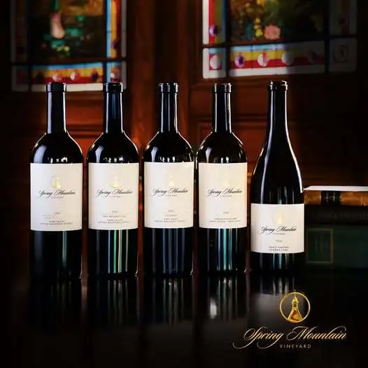 Five Spring Mountain Vineyard wines on display: 2022 Chevalier, Occasus, and Resurrection Cabernet Sauvignons, and 2024 Heintz Chardonnay and 2024 Crocker Sauvignon Blanc.