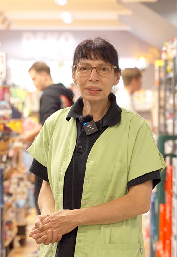 Portrait einer Frau in einem Markt