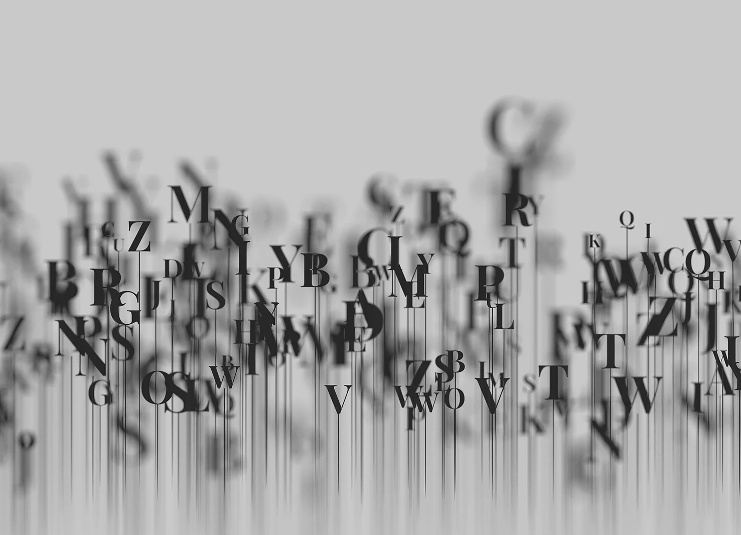 Black letters in ink bleeding down the page | Kelly Agency Images