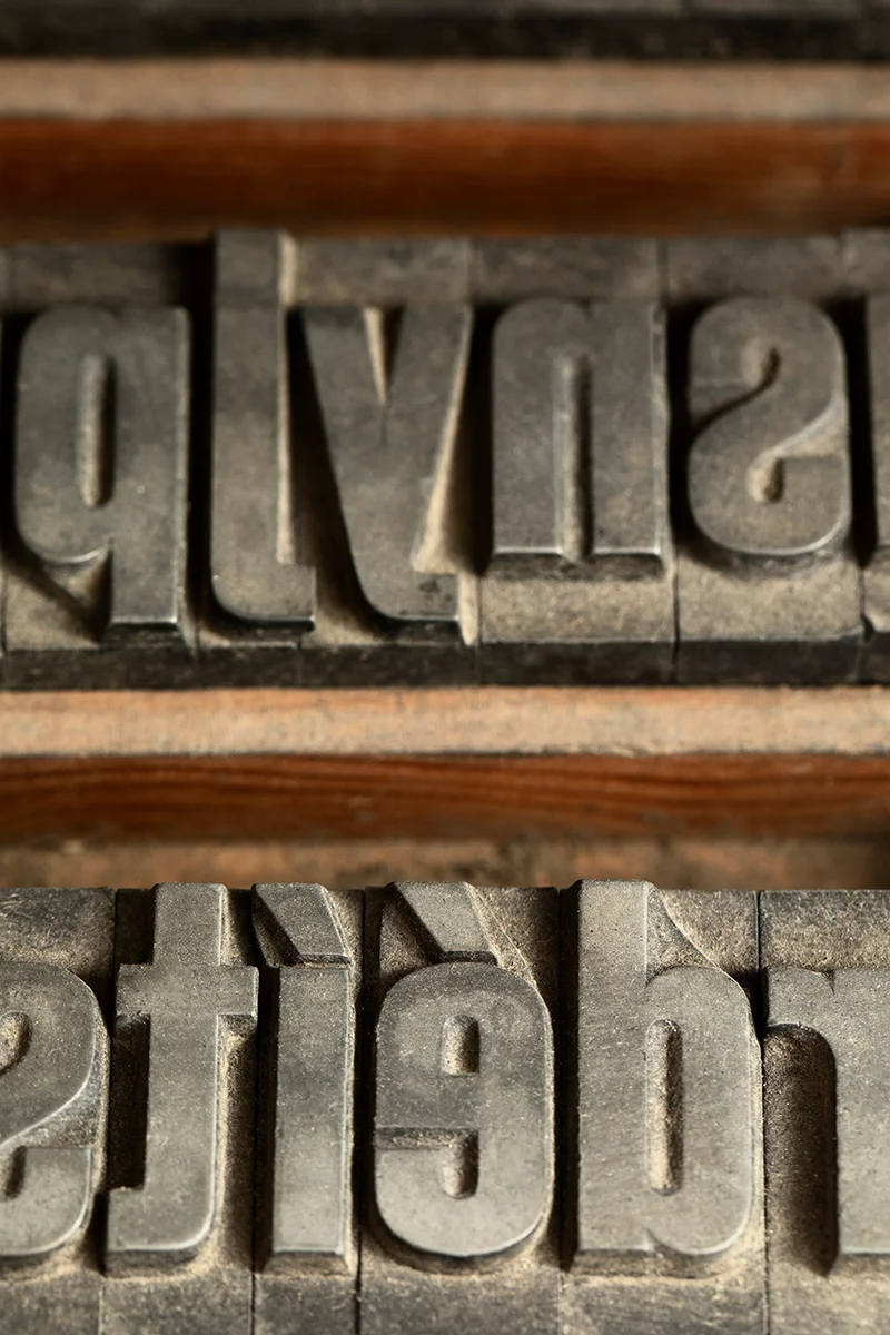 The underside of a stamp with letters | Kelly Agency Images