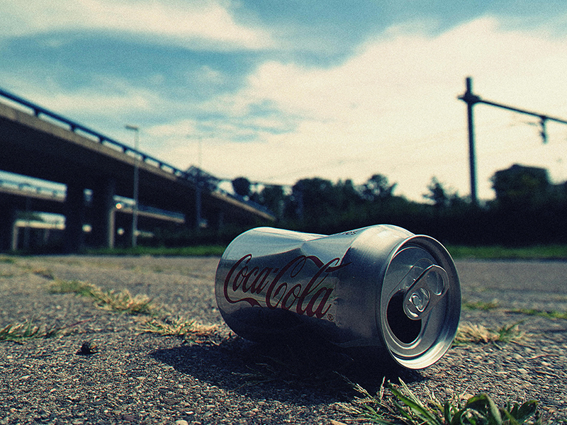 A tin lying on the pavement | Kelly Agency Images