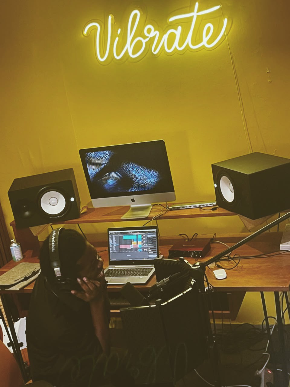a music artist recording at vibrate studio