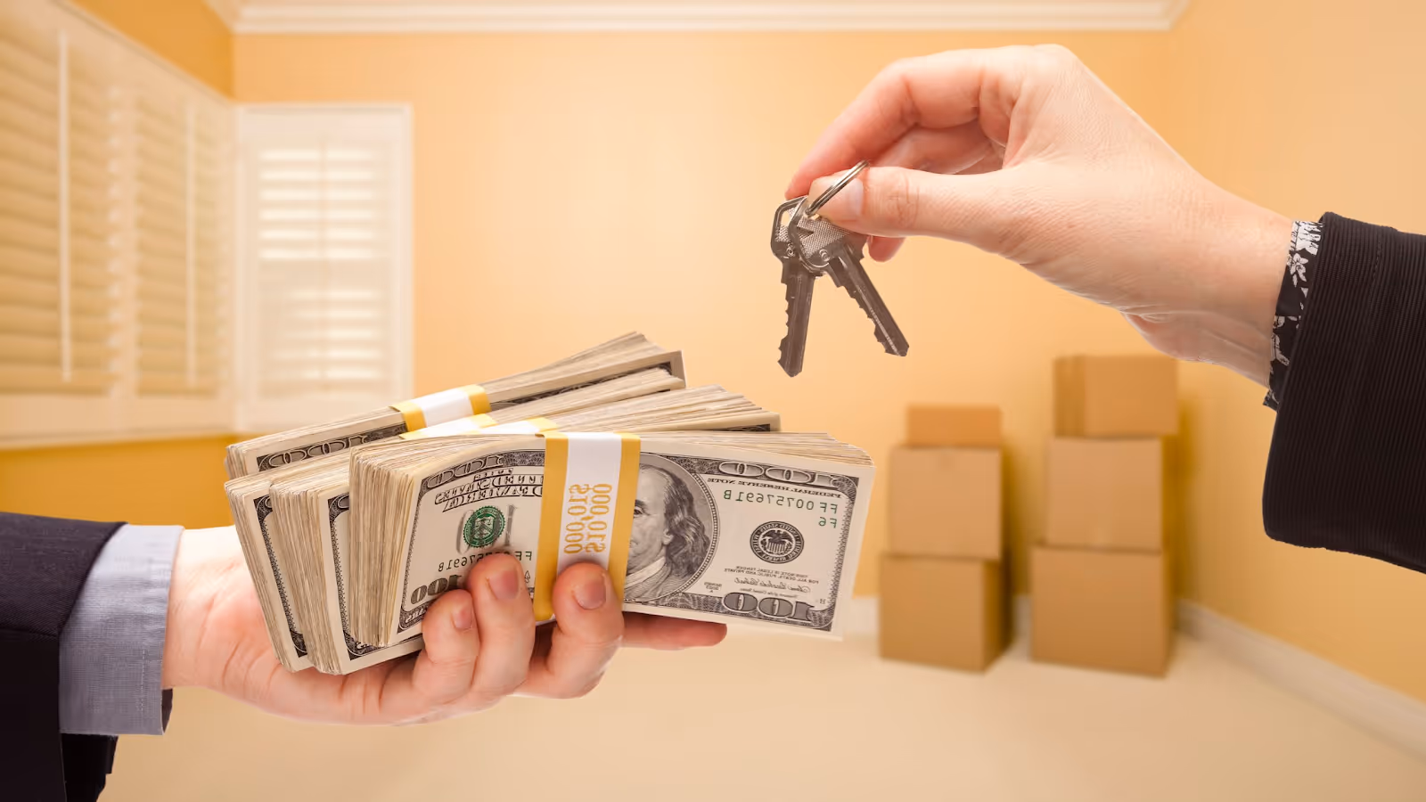 A person handing over a stack of moneyAI-generated content may be incorrect.