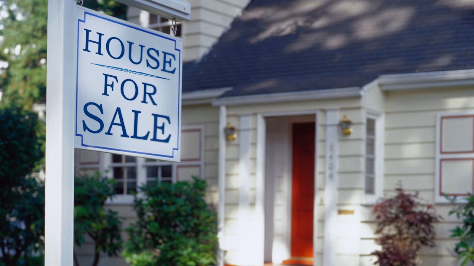 A house for sale sign in front of a houseAI-generated content may be incorrect.
