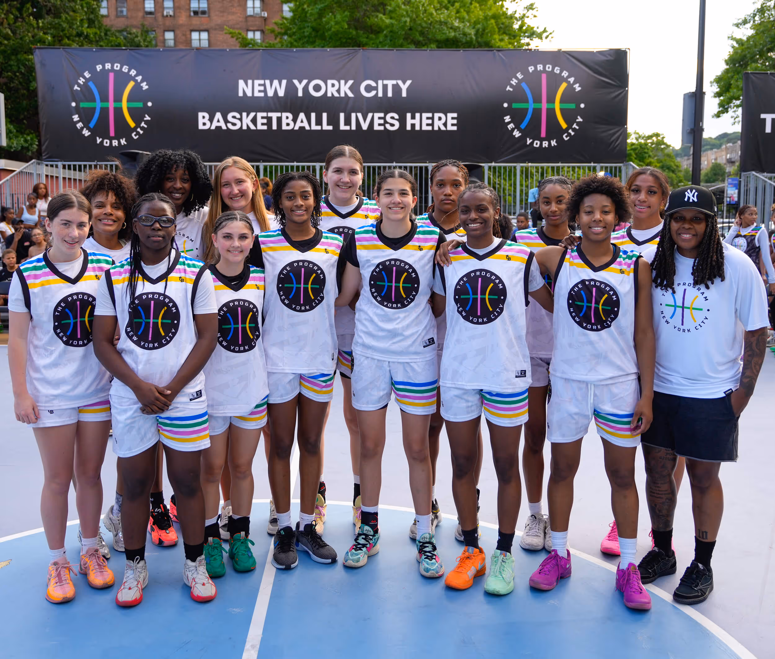 Girls basketball team at The Program Classic 2024 at Dyckman Park in NYC, including Olivia Vukosa, Mia Pauldo, Mya Pauldo, Jordyn Jackson, and Ryan Carter