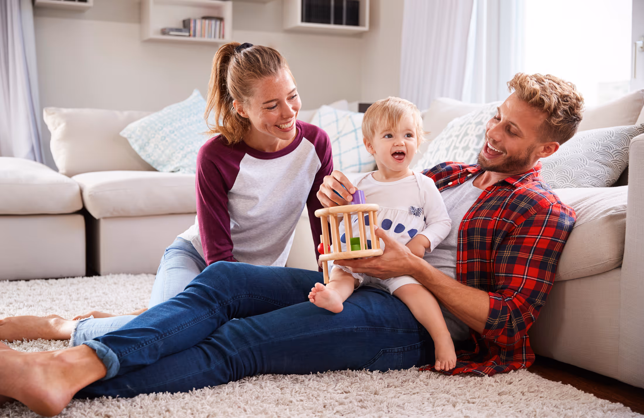 Family sitting together on the floor