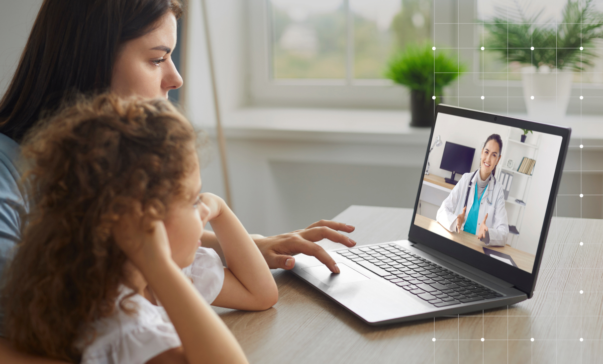 Woman and daughter talking to doctor over video call